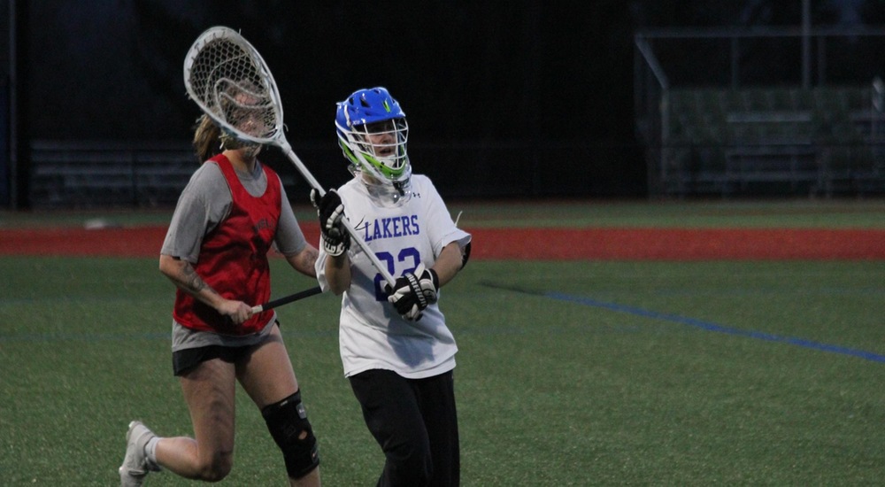 Russell Nets Two in Home Opener